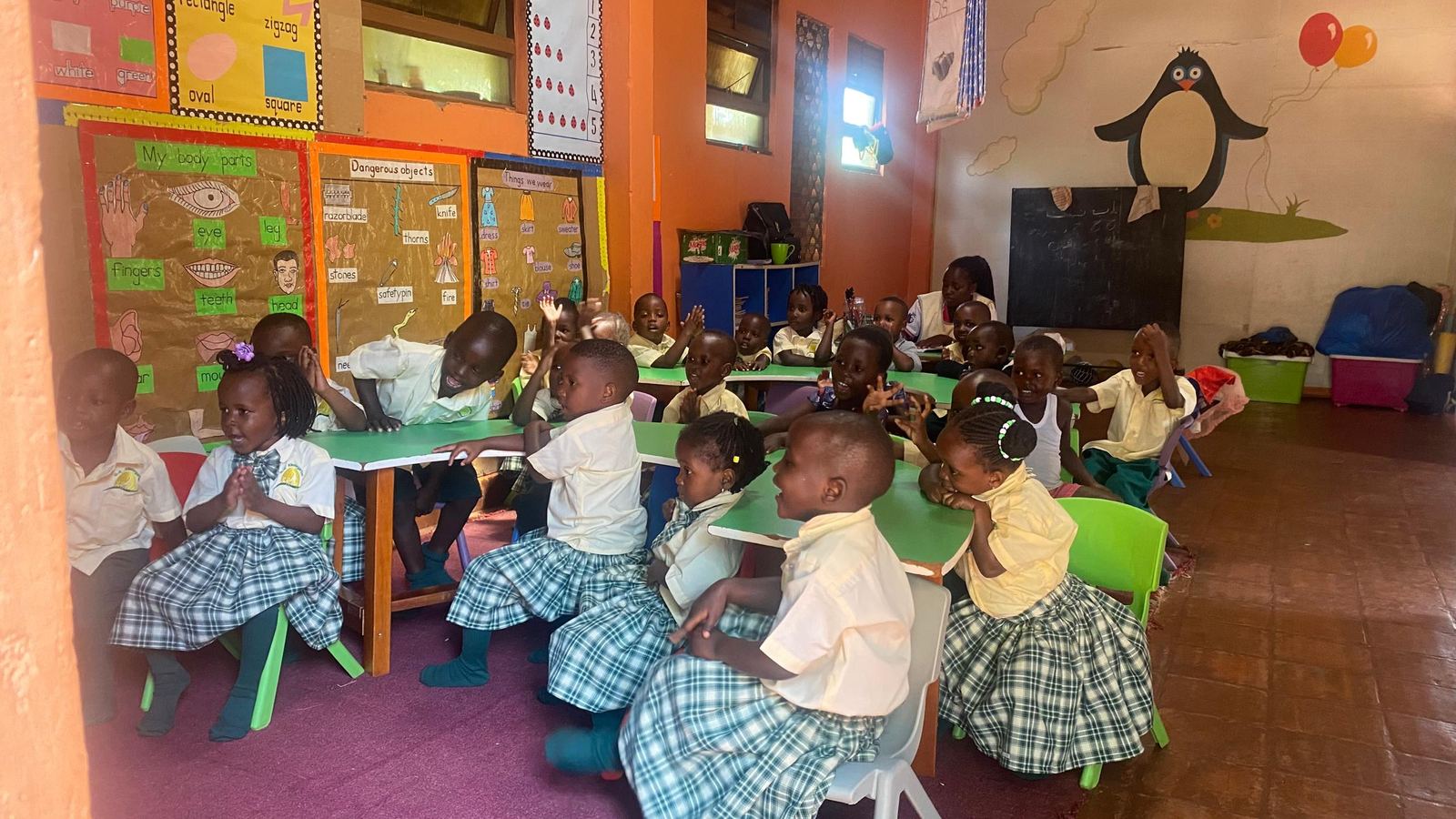 Children gathered together in their classroom